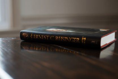 image of the biography of Ernie Reisinger